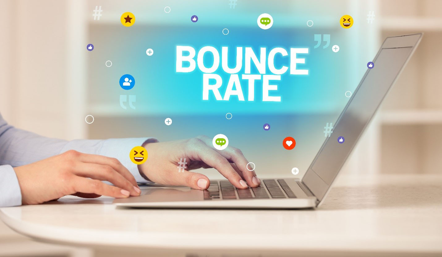 person using laptop with the word 'bounce rate'